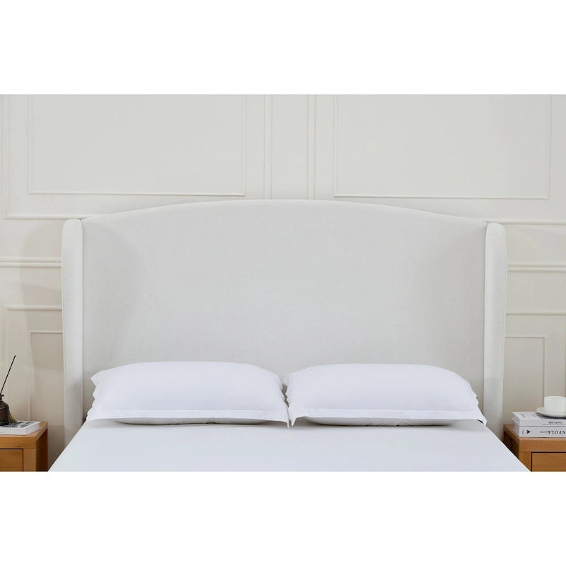 Lit plateforme avec tête de lit capitonnée
